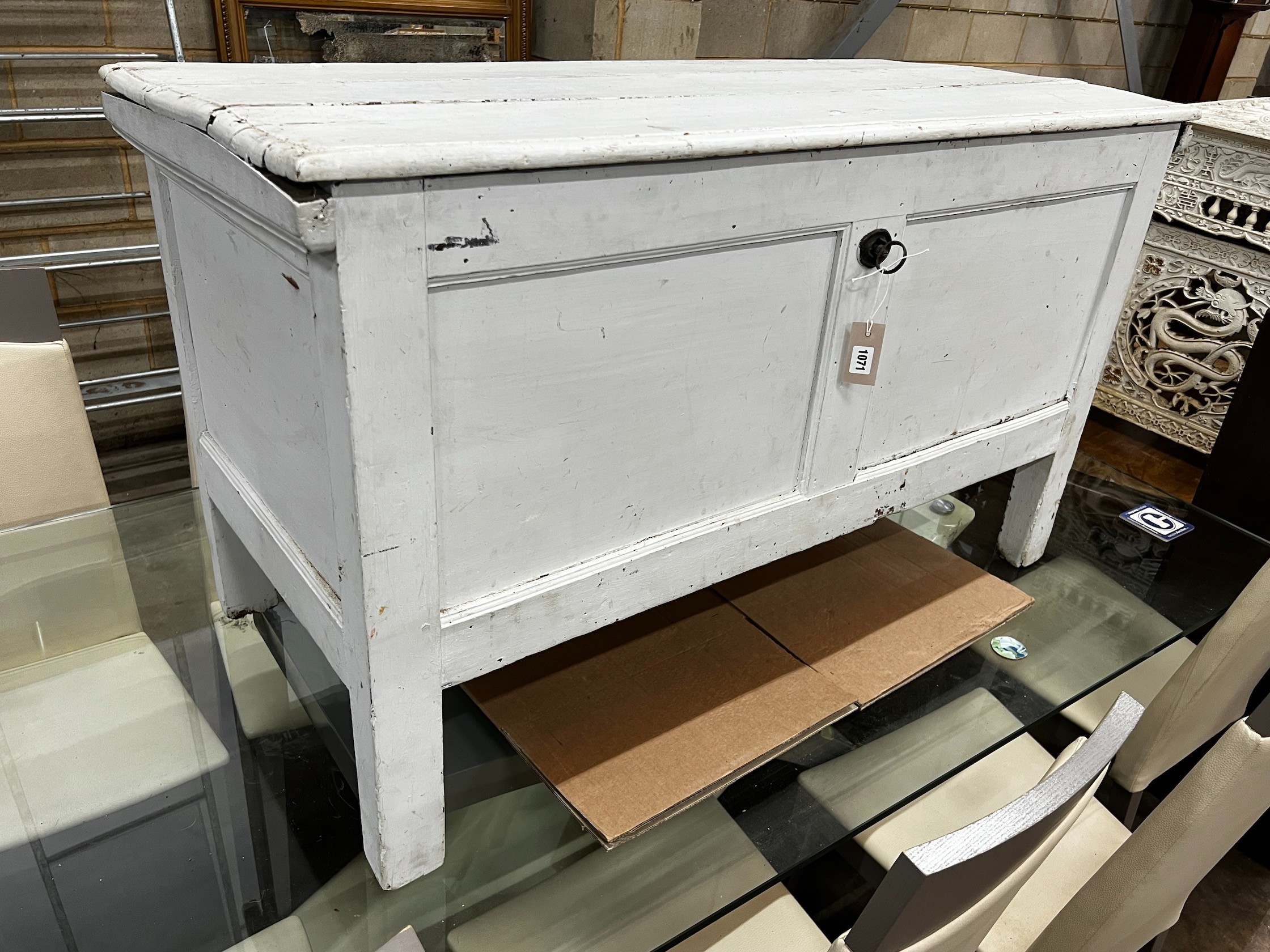 An 18th century later painted oak coffer, width 123cm depth 55cm height 71cm